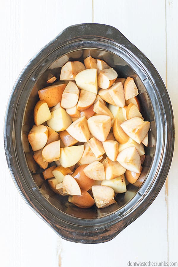 Sliced apples in a crockpot.