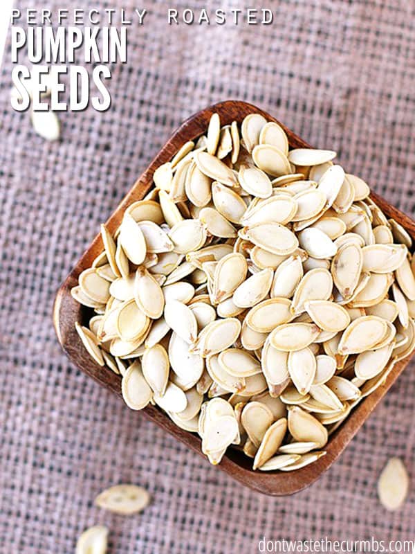 The best recipe for perfectly roasted pumpkin seeds! This step by step guide makes it easy to make the perfect fall snack.
