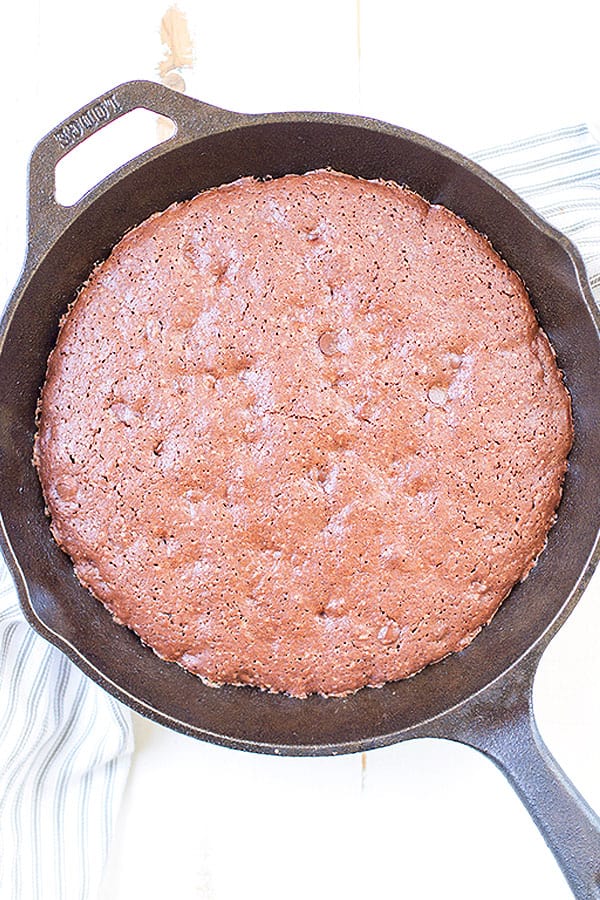 When using a cast iron skillet for brownies, you can preheat the skillet for even heating and a perfect texture - these brownies turn out soft on the inside, and crispy on the outside! So chocolately and delicious!