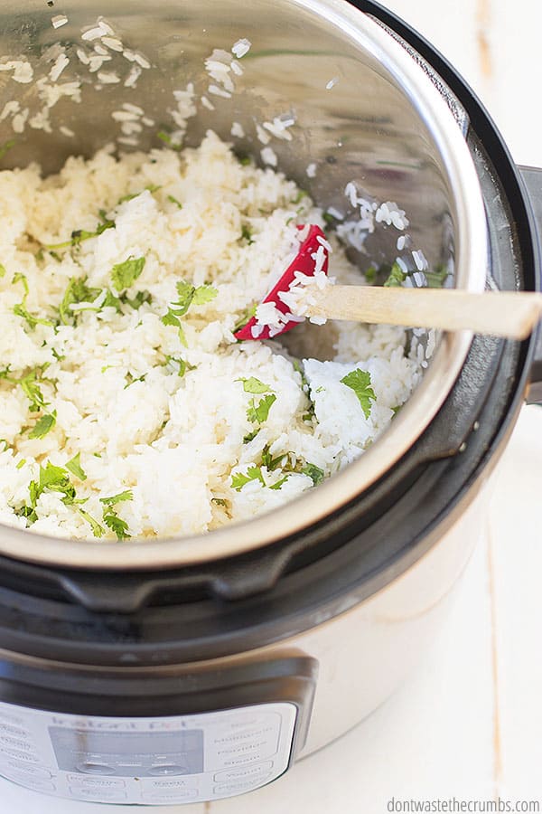 The Instant Pot is such an easy and convenient way to cook this cilantro lime rice recipe. Cook for 4 minutes, fluff with a fork, and you're done! 