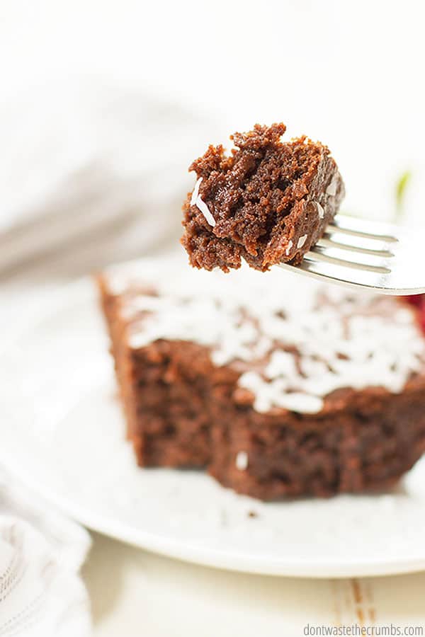 Coconut oil in this recipe for chocolate brownie cake is what makes the cake taste so delicious and fudgy like a brownie. Decorate with shaved coconut for a light coconut taste! 