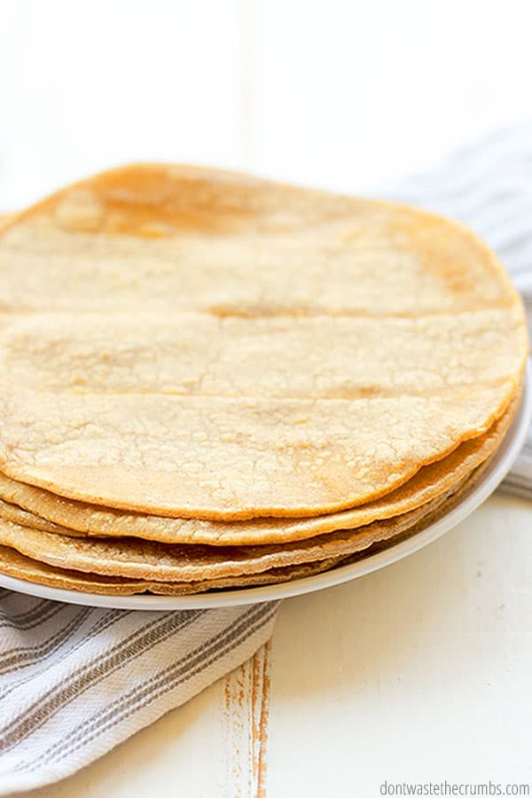 You can use either store-bought or leftover homemade tortillas to make homemade tortilla chips. It's a perfectly delicious way to save on food waste!