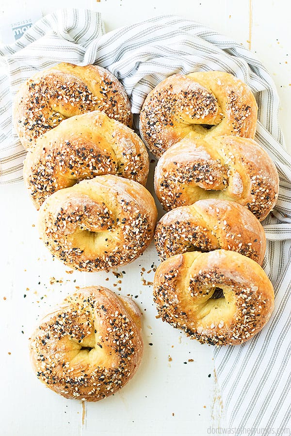 Eight homemade 2 ingredient bagels stacked in two rows.