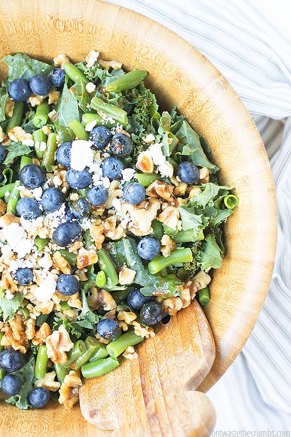 I like to serve this kale salad with chicken on the side, but it is also great as a vegetarian meal!