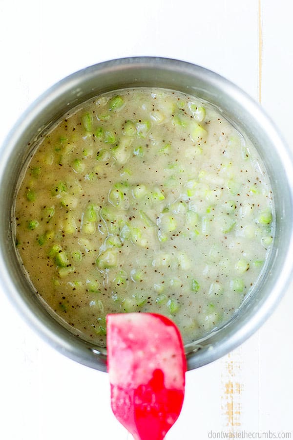 A saucepan with cream of celery soup.