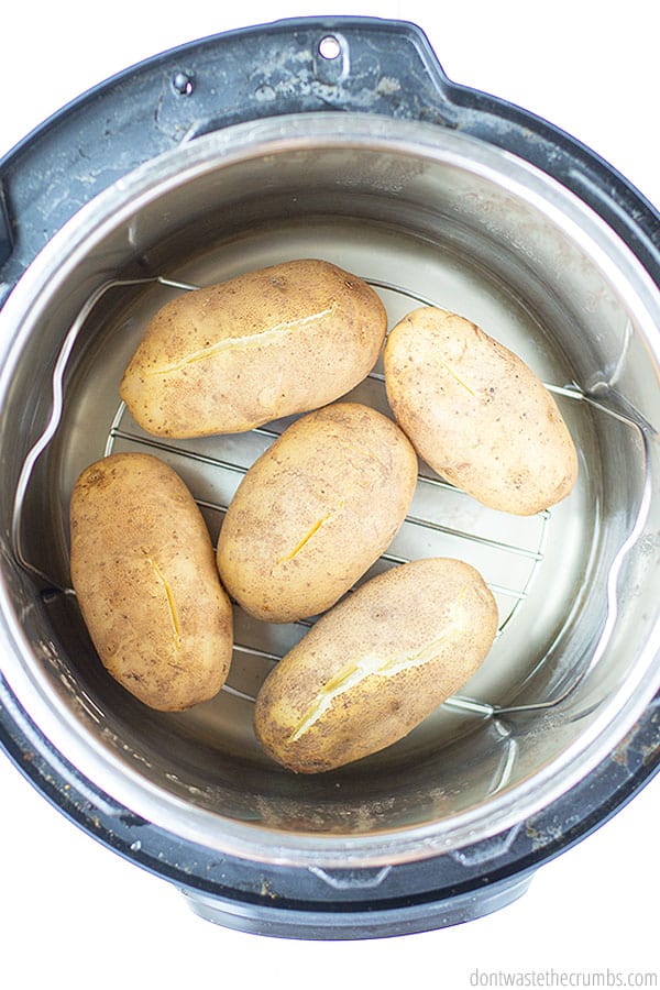 Making baked potatoes in the instant pot is an amazing hands off way to feed your busy family!
