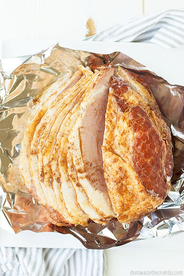 Well seasoned and spiral sliced Instant Pot ham makes for the perfect golden brown main dish at your holiday gathering.