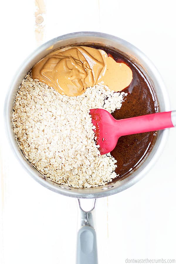 Oatmeal, peanut butter, and chocolate in a pan about to be mixed to make the no bake cookie dough! 