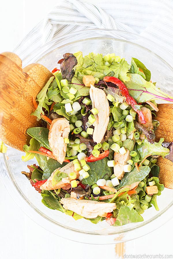 Buffalo chicken  ranch salad in a glass bowl.