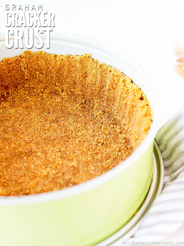 The cover to the post Graham Cracker Crust. Shown is a beautifully textured crust in a pie pan set on a towel.  