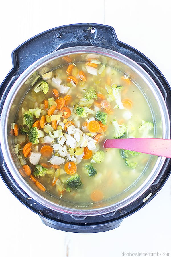 Instant pot filled with homemade chicken detox soup.