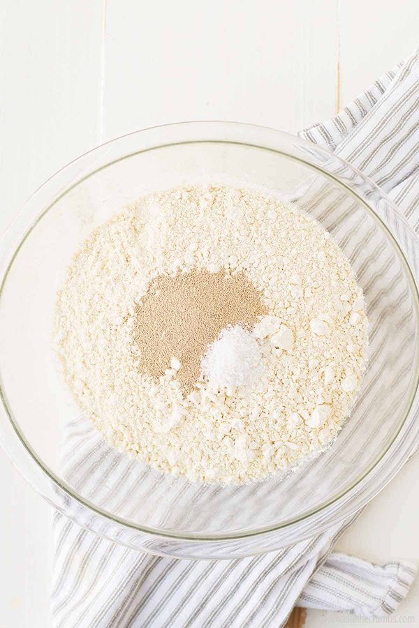 Salt, flour, yeast in a glass bowl