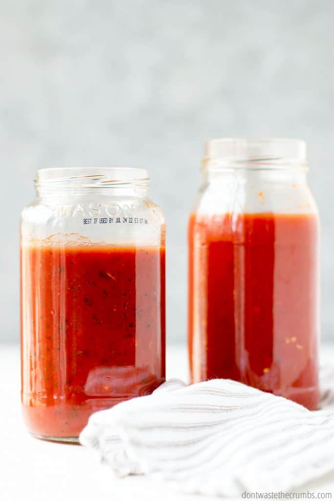 When freezing this spaghetti sauce, several inches are left at the top of the jar to accommodate expansion of the liquid as it freezes.