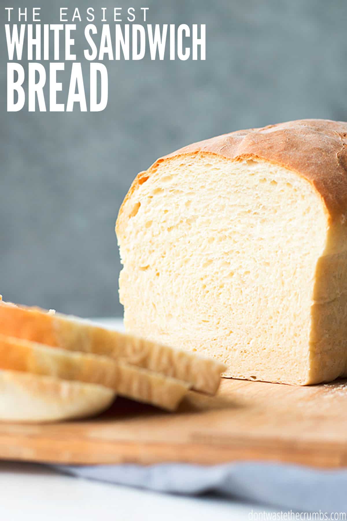 A sliced homemade white sandwich bread with the text overlay, "The Easiest White Sandwich Bread Recipe."