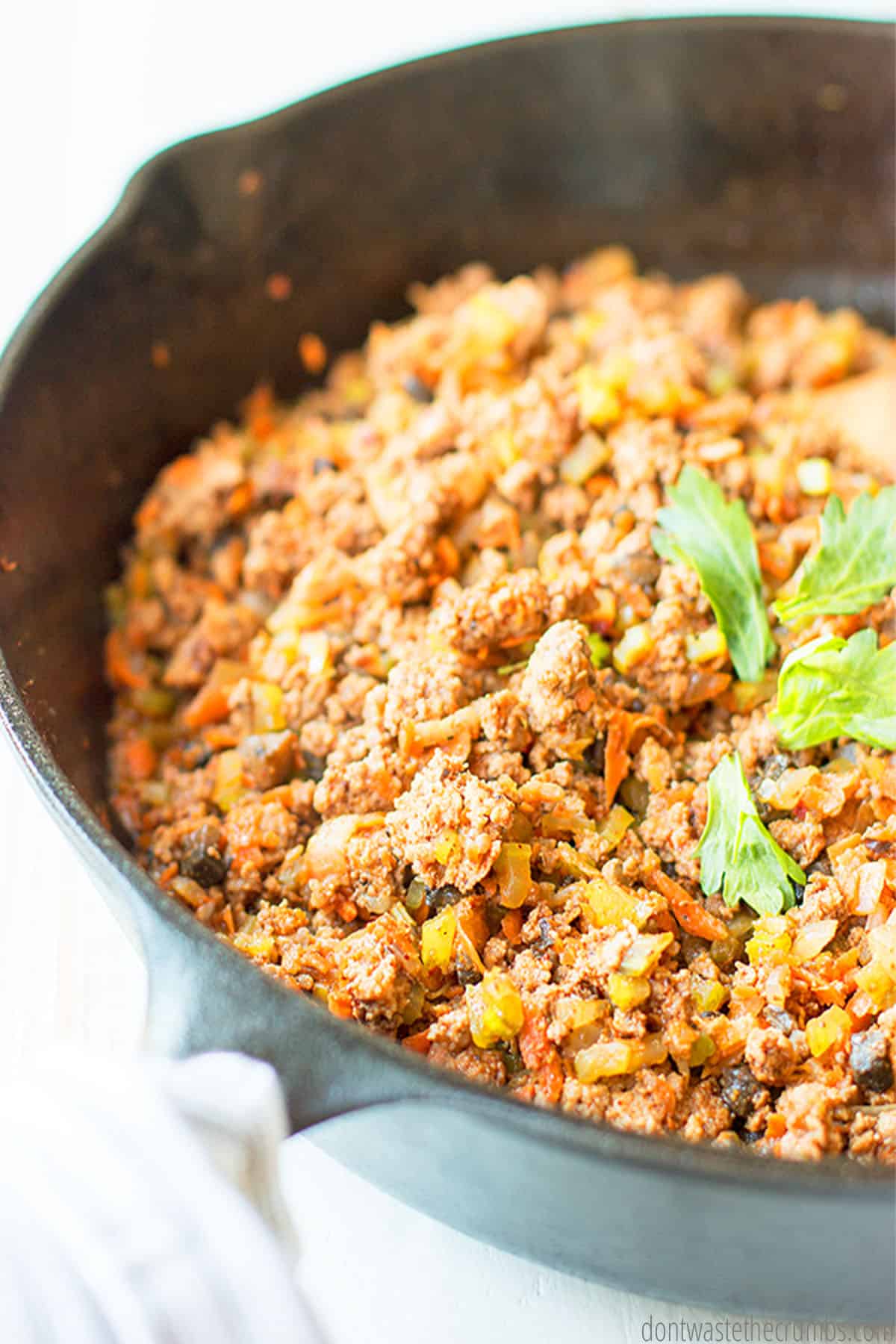 Ground beef taco meat in a cast iron skillet