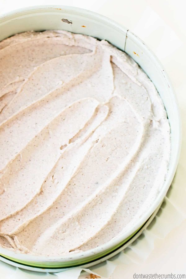 The filling this tasty no bake coconut cream pie is spread across a springfoam pan.