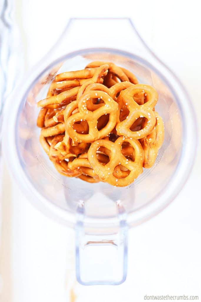 Pretzels in a blender. This is the first step in making peanut butter granola bars.