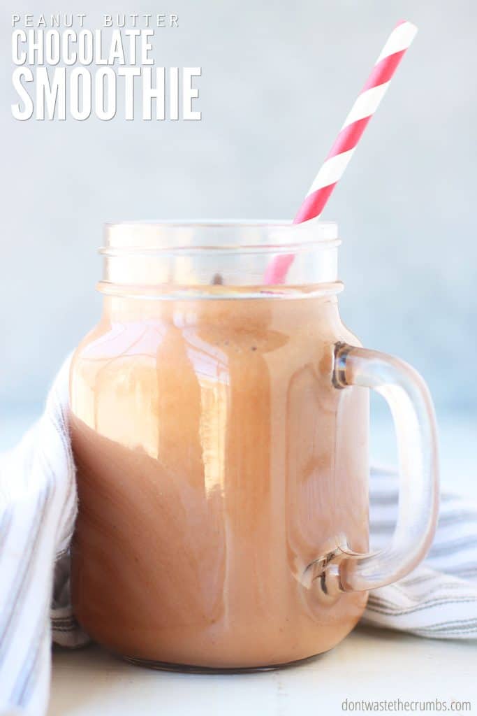 Glass jar with chocolate peanut butter smoothie and a striped red and white straw. Text overlay reads "Peanut Butter Chocolate Smoothie."