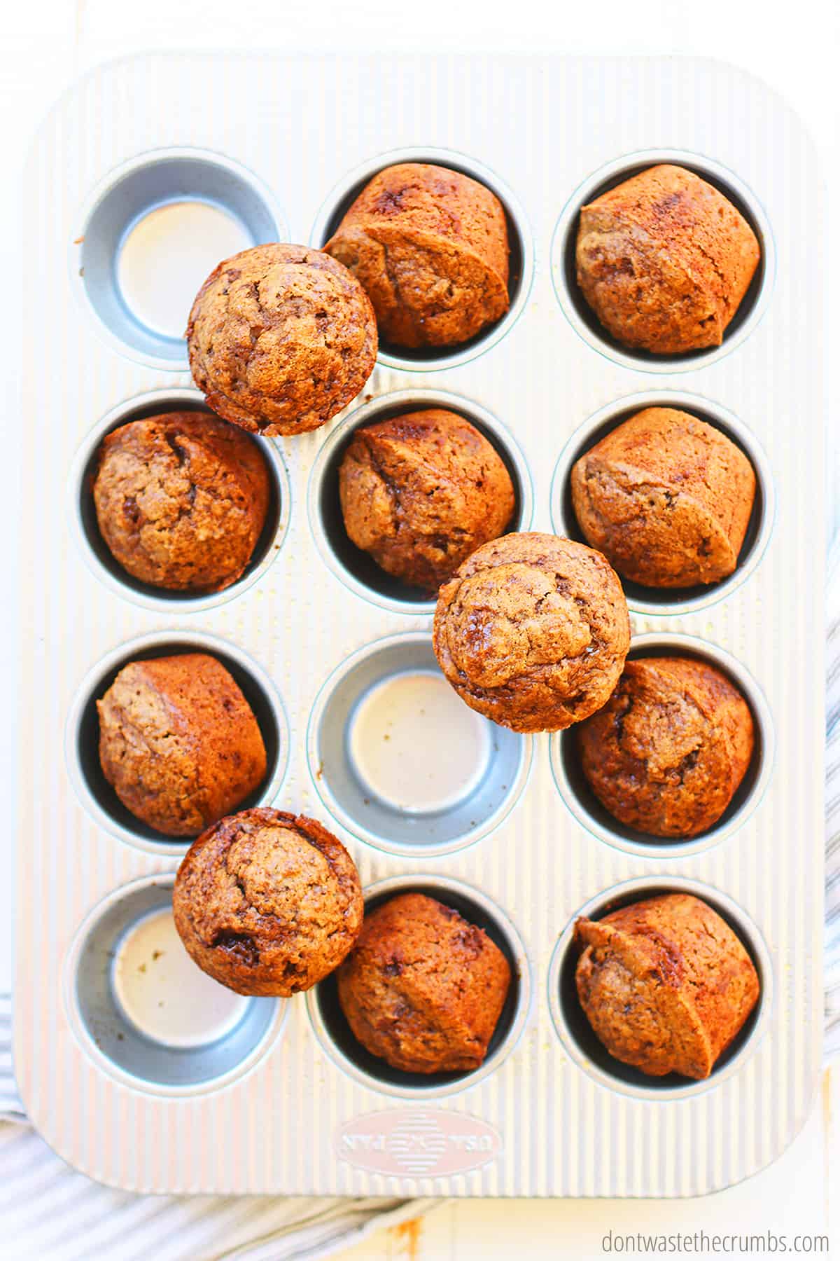 Remove applesauce muffins from muffin tin and store in an air-tight container or freeze in plastic freezer bags for up to 3 months.