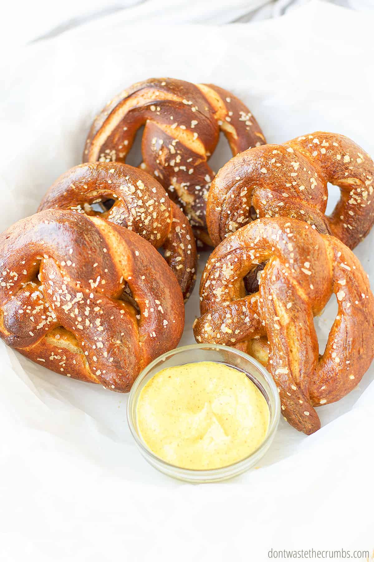 Enjoy your homemade soft pretzels with a mustard dip!
