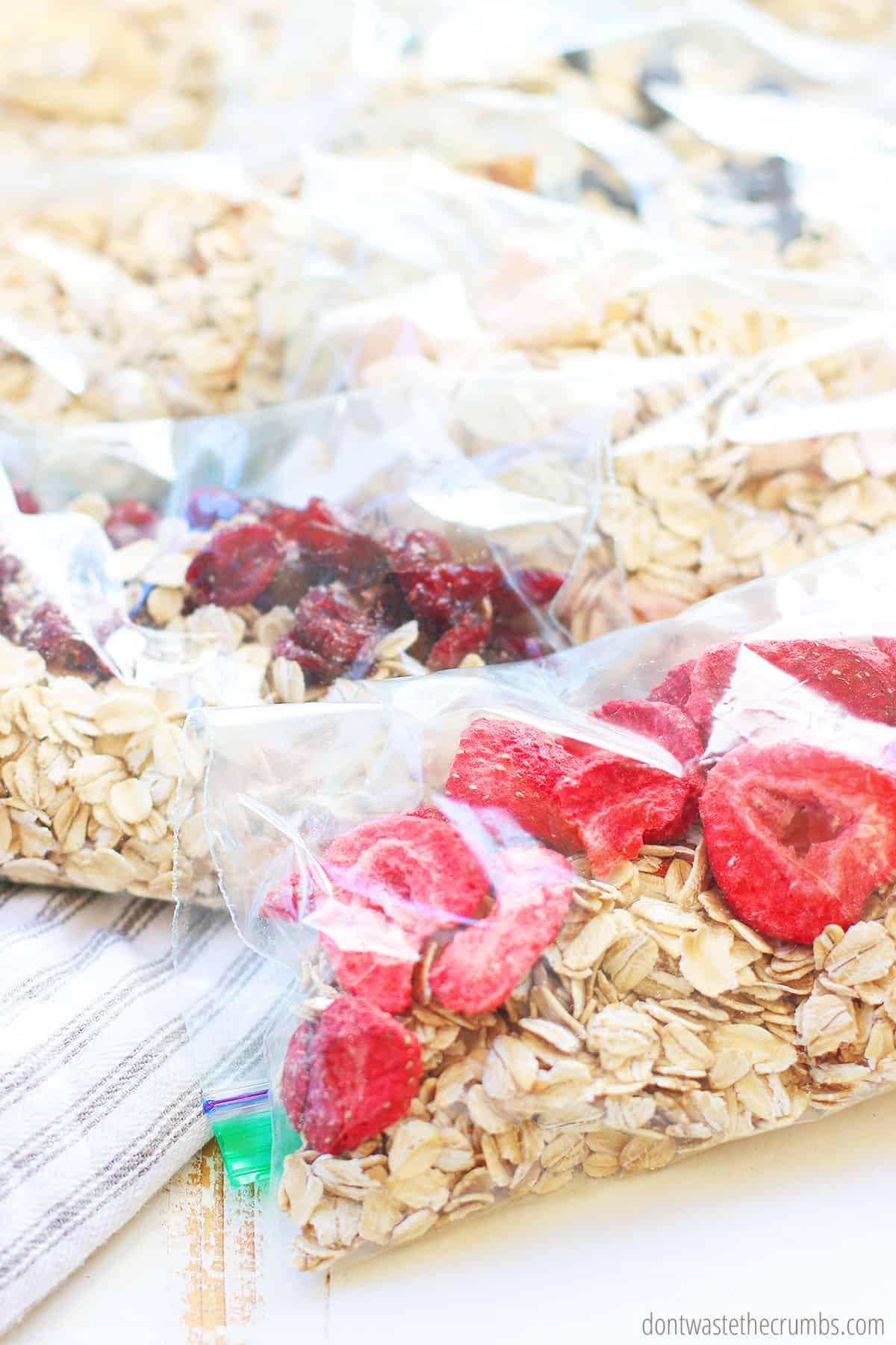 Ziplock bags with homemade instant oatmeal packets. They are stacked on one another.