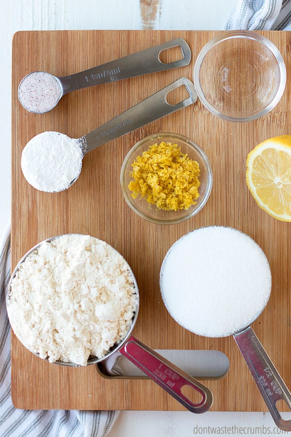 The ingredients for lemon cake mix are simply flour, sugar, baking powder, salt and lemon zest. To make a cake, add butter, milk, lemon extract and eggs!