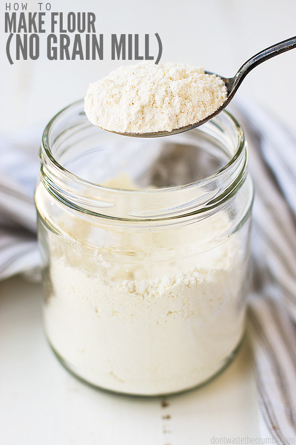 White flour on a spoon held over a glass jar. Text overlay "How to Make Flour (No Grain Mill)"
