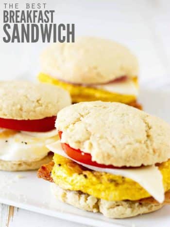 Three breakfast sandwiches on a plate.