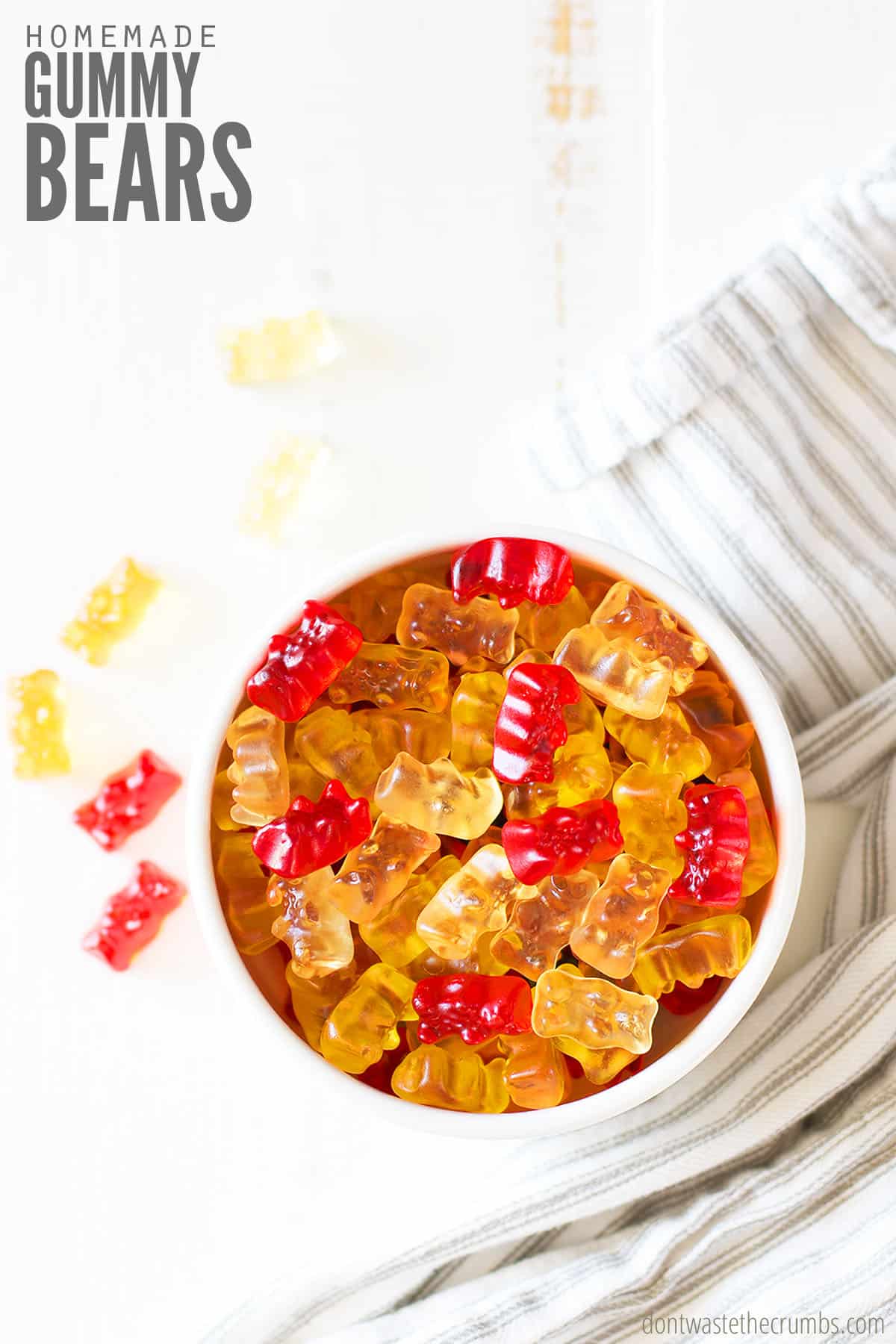 Text overlay Homemade Gummy Bears. Image showing bowl of healthy homemade gummies. Try out this gummy bear recipe.