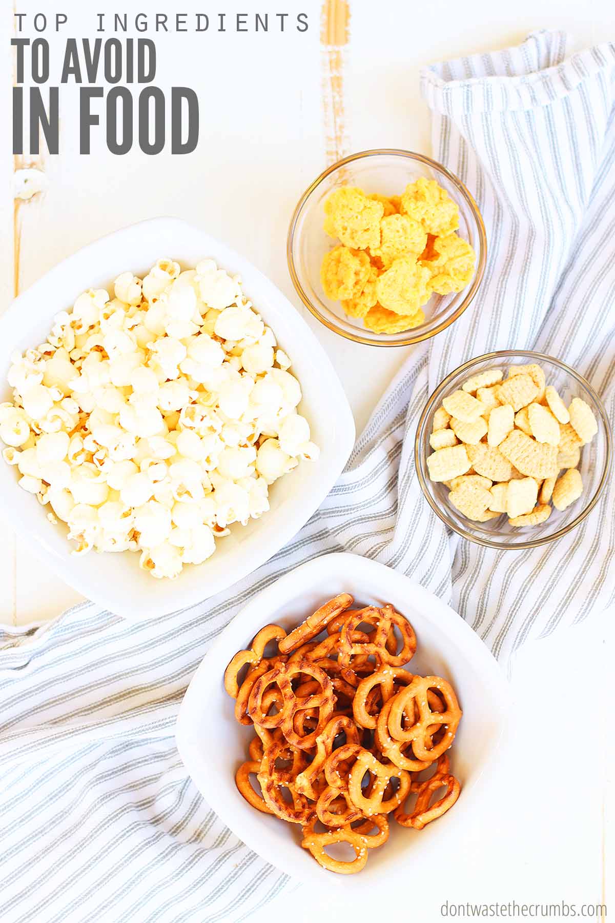 Bowl of popcorn, bowl of pretzels, bowl of chex cereal, and bowl of rice cakes. Learn more about food additives. Text overlay reads Top ingredients to avoid in food.