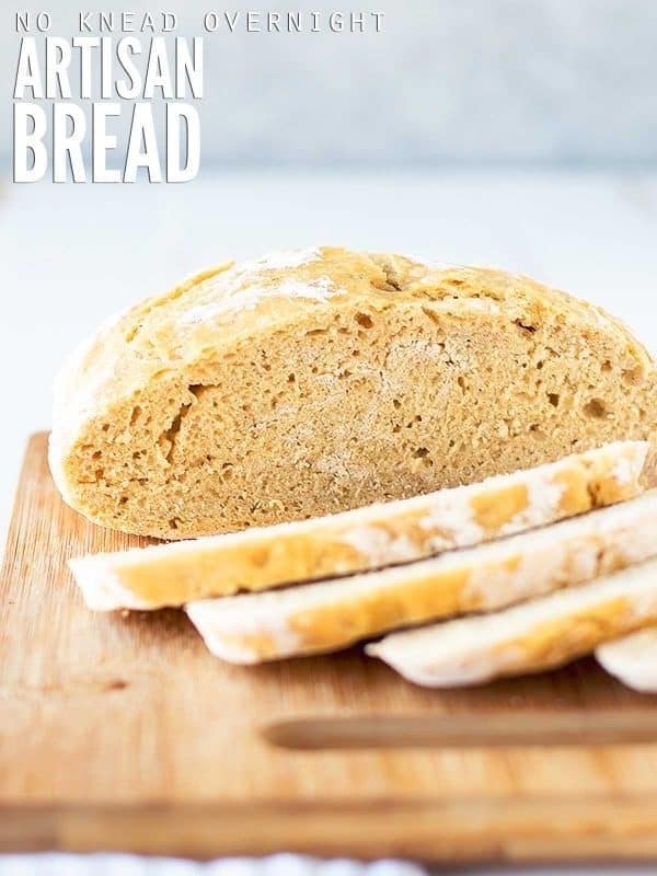 A loaf of no knead bread on a cutting board, with multiple slices. Text overlay reads "No-Knead Overnight Artisan Bread"