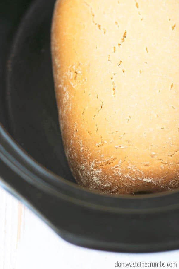 Close up view of baked slow cooker bread.