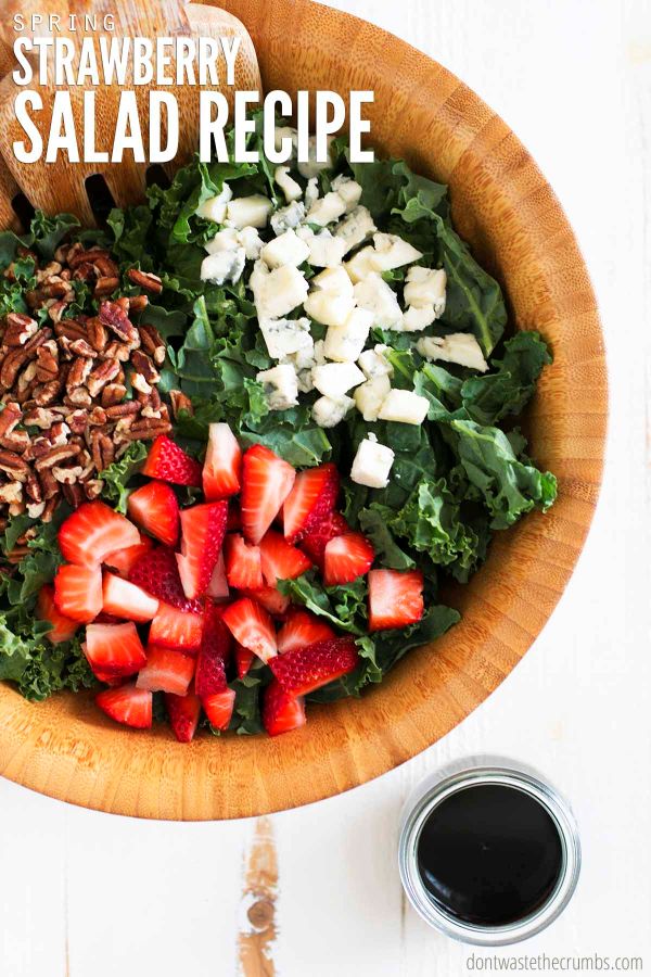 Large bowl of strawberry salad. Text overlay reads, "Spring Strawberry Salad Recipe".